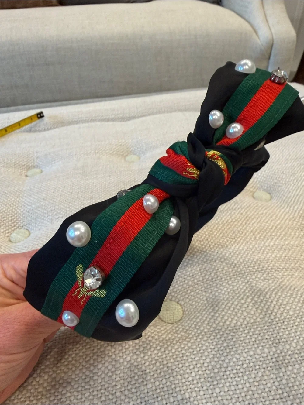 Black headband with Gold Bee and Red & Green Stripe and Pearl Accents